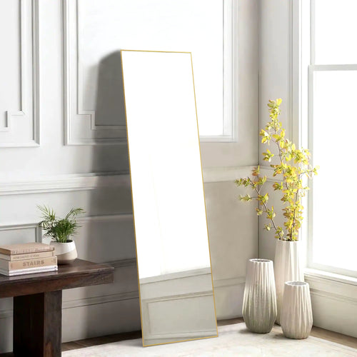 Close-up of the ultra-thin gold frame on the square top standing mirror.